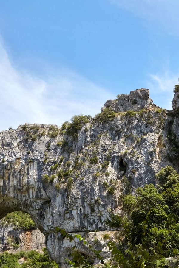 The Pont d'Arc is a natural stone arch in the Ardeche Gorges, France, Europe. Sunny summer day